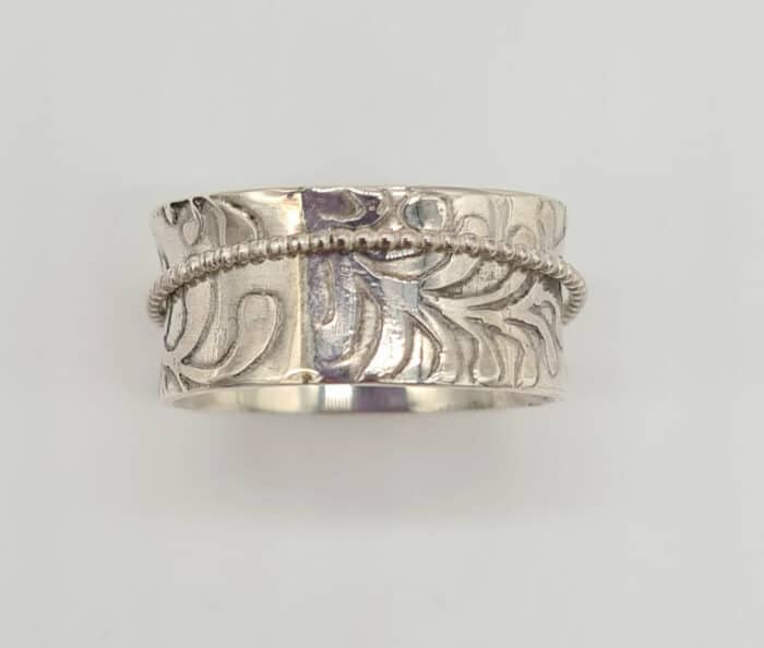 Silver seaweed spinner ring